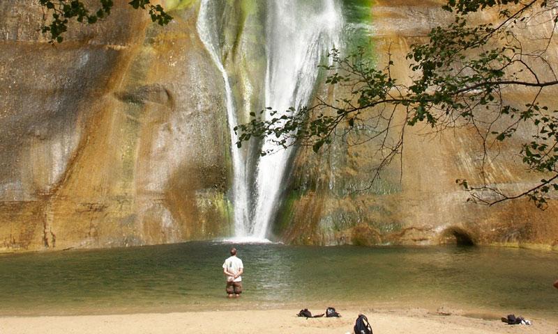Taking a dip at the base of Calf Creek Falls